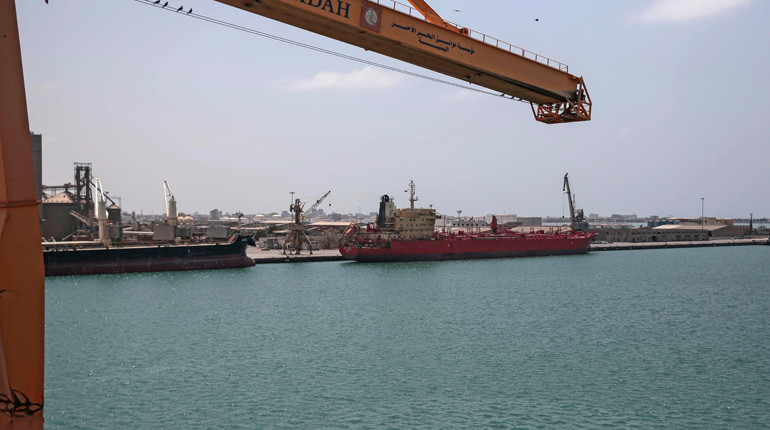 A cargo ship and oil tanker docked at Hodeida, Yemen