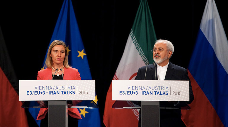 EU High Representative for Foreign Affairs Federica Mogherini and Iranian Foreign Minister Mohammad Javad Zarif, from left, address the media after closed-door talks on the Iranian nuclear program in Vienna, Austria, 14 July 2015. (© European Union, 2015)