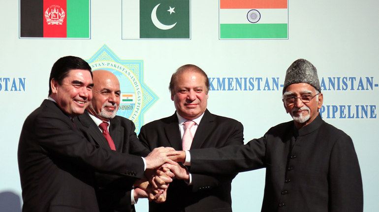 Turkmen President Gurbanguly Berdymukhamedov, left, shakes hands with Afghan President Ashraf Ghani, second left, Pakistani Prime Minister Mohammad Nawaz Sharif, second right, and Indian Vice President Hamid Ansari during the ground breaking ceremony for the TAPI pipeline in Ashgabat, Turkmenistan. 