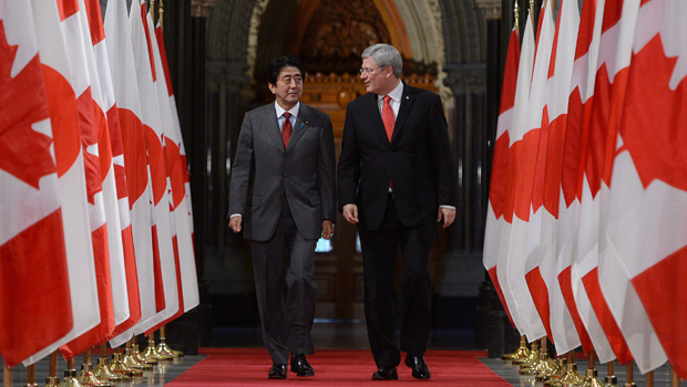 Japan’s Prime Minister Shinzo Abe, left, visiting Canadian Prime Minister Stephen Harper in 2013. (PA)