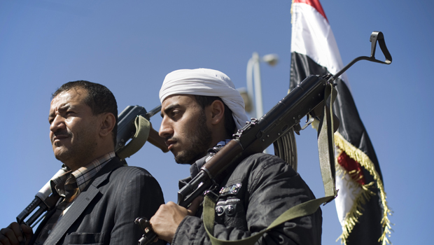 Houthi Shia Yemenis hold their weapons during a rally to show support for the militiamen. (PA)