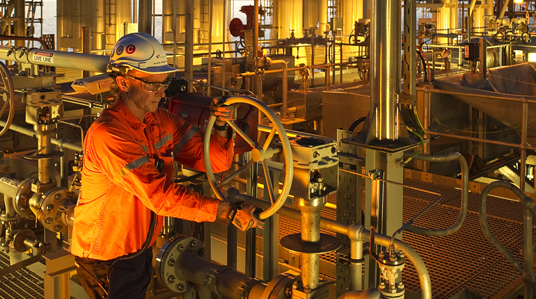 Woodside’s Pluto LNG plant. The company has cut thousands of jobs recently. (Woodside)