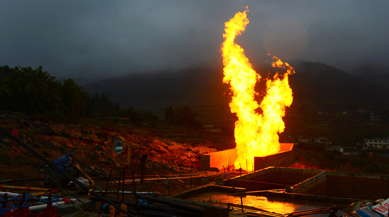 Flare from a Chinese shale well. The government may let more companies join in exploration. (Sinopec)