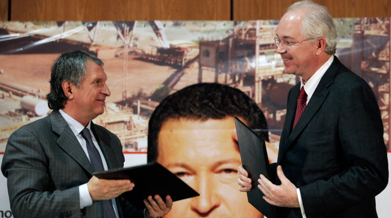 Rosneft CEO Igor Sechin (left) and Venezuela’s Oil Minister Rafael Ramirez in Caracas, January 2013. (PA)