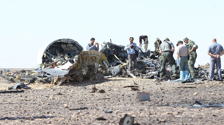 Investigators search the wreckage of the Metrojet airliner crash in Egypt. (PA)