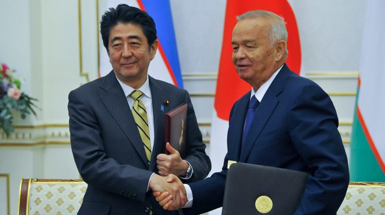 Uzbekistan’s President Islam Karimov (right) with Japan’s Prime Minister Shinzo Abe in Tashkent, Uzbekistan. (PA)
