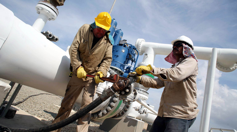 Workers on the Venezuela-Colombia pipeline. Ecopetrol has confirmed it will start importing Venezuelan gas. (PA)