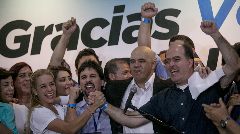 Leaders of Venezuela’s Democratic Unity Roundtable celebrate their victory in the country’s general election. (PA)