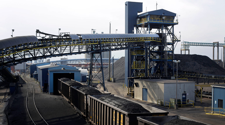 Train cars containing coal unload at Dominion Terminal Associates’ facility in Newport, Virginia. (PA)