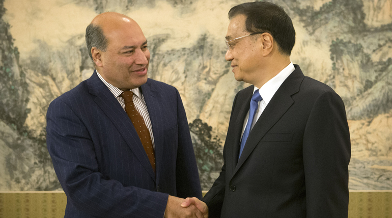 EBRD President Suma Chakrabarti, left, and Chinese Premier Li Keqiang in January. (PA)