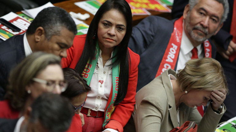 Workers’ Party lawmakers react to the vote to impeach Brazilian President Dilma Rousseff. (PA)
