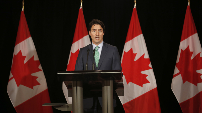 Canadian Prime Minister Justin Trudeau faces a choice between reducing emissions and maximising revenue. (PA)