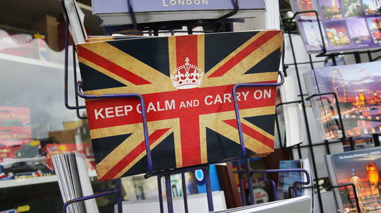 A postcard in a London shop: policymakers are trying to heed the advice. (PA)