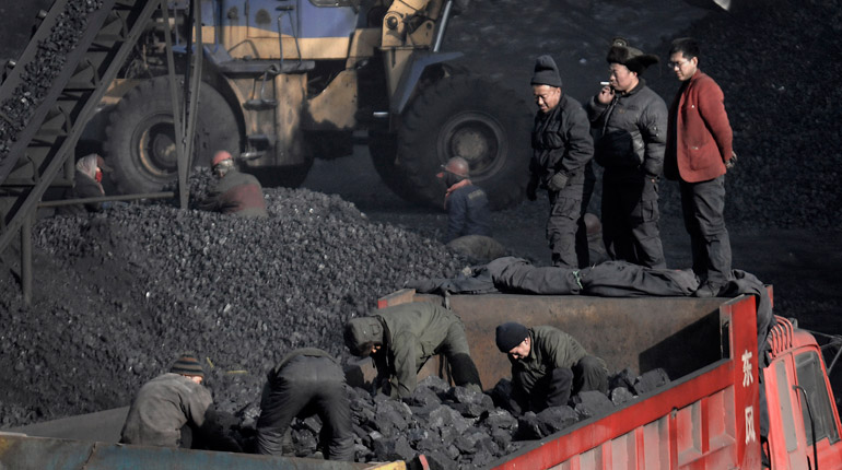 Workers at a coal mine in Shanxi. The region is struggling to make use of CMM. (PA)