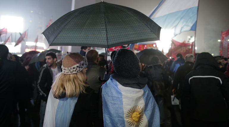 Protesters at a demonstration against Argentine President Mauricio Macri’s utility price hikes. (PA)