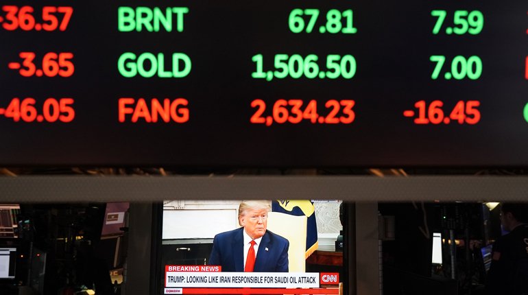 Traders work on the floor of the New York Stock Exchange