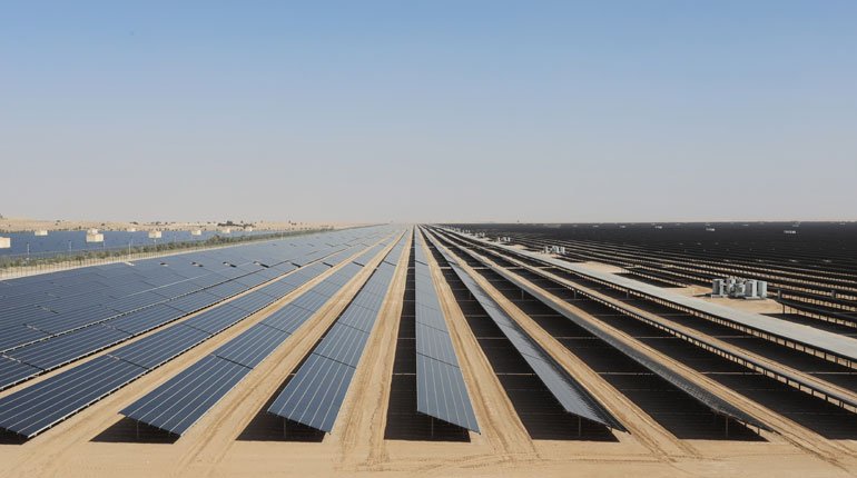 A field of solar photo-voltaic panels that form part of a solar park in Dubai, UAE