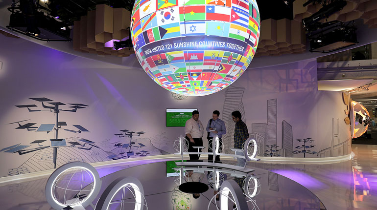 A globe showing flags of the world at COP23