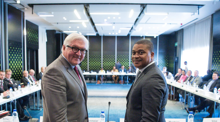 Mozambican Energy Minister Max Tonela (right) at the German-Mozambican Economic Forum in Maputo. (PA)