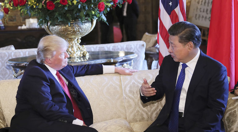 Chinese President Xi Jinping (right) and his US counterpart Donald Trump